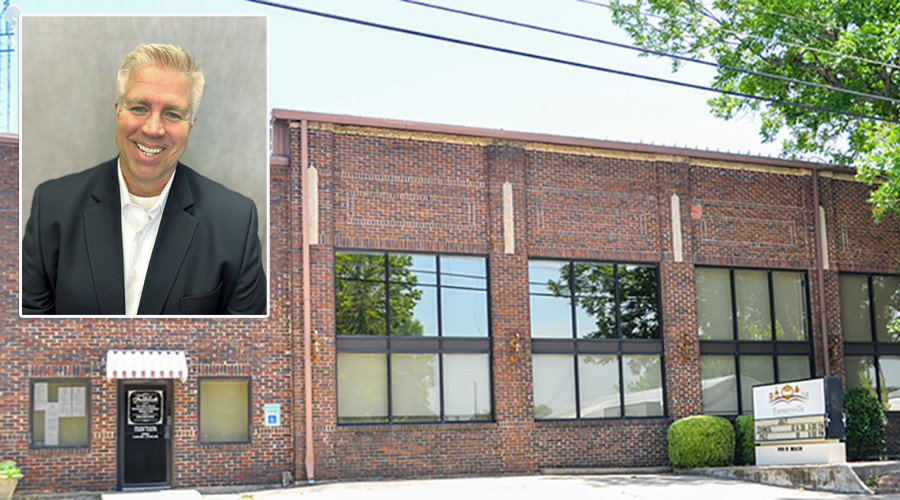Farmersville EDC building front with image of Rodney Williams
