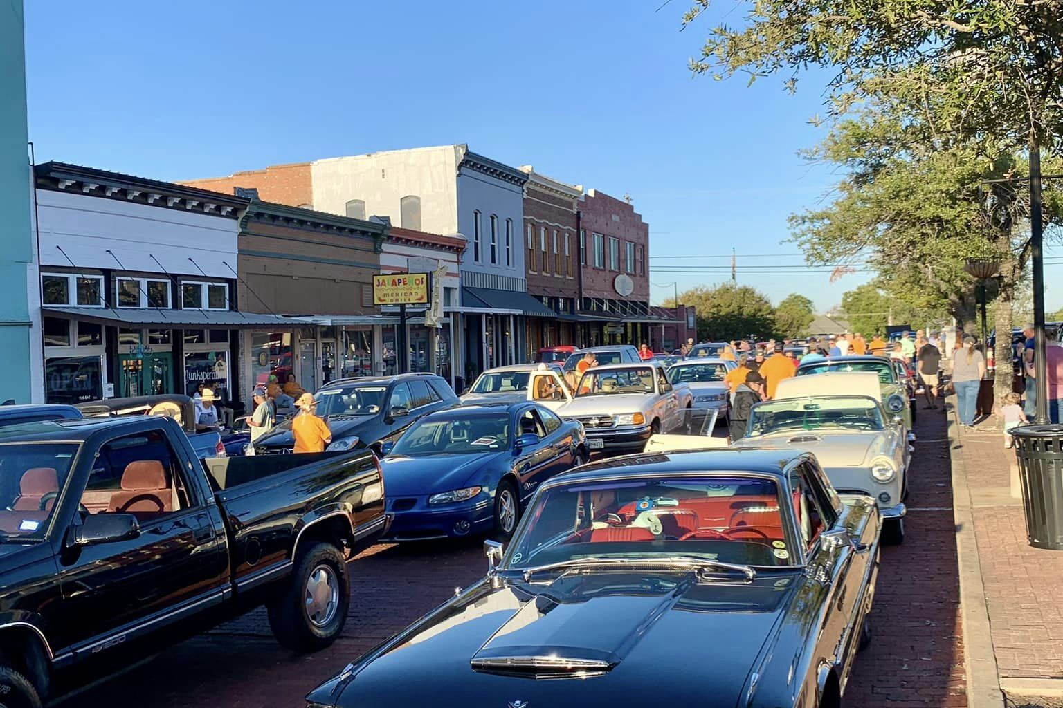 classic cars on a downtown farmersville street